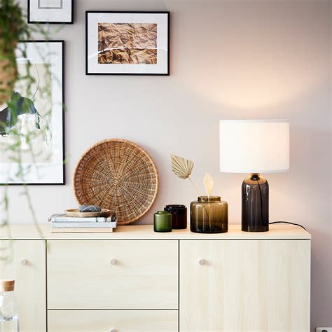 Ersnas ikea - A sideboard gives you plenty of space to store things and a surface to create an attractive display - or to unload serving dishes while you eat. ERSNÄS sideboard has deep and spacious drawers with plenty of room for storing plates, serving dishes and accessories.